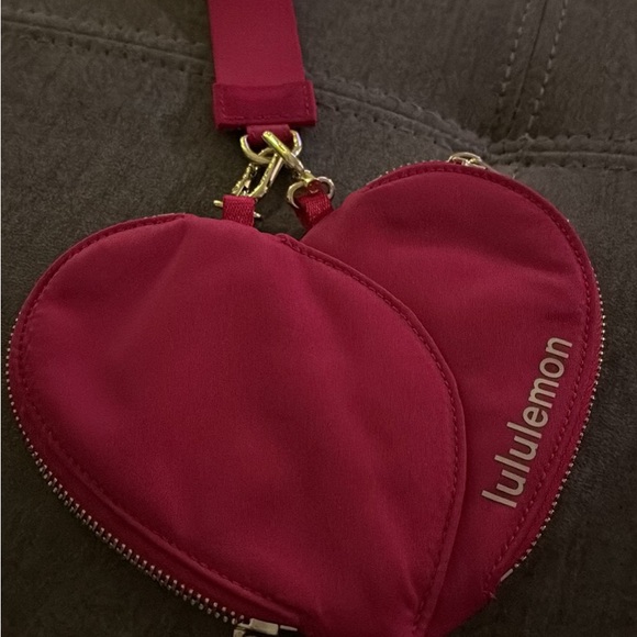 lululemon athletica Handbags - Lululemon Athletica pink Heart Wristlet